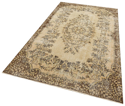 Handwoven Antique Wool Rug: Beige Tones, Elegant Motifs