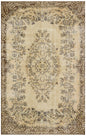 Handwoven Antique Wool Rug: Beige Tones, Elegant Motifs